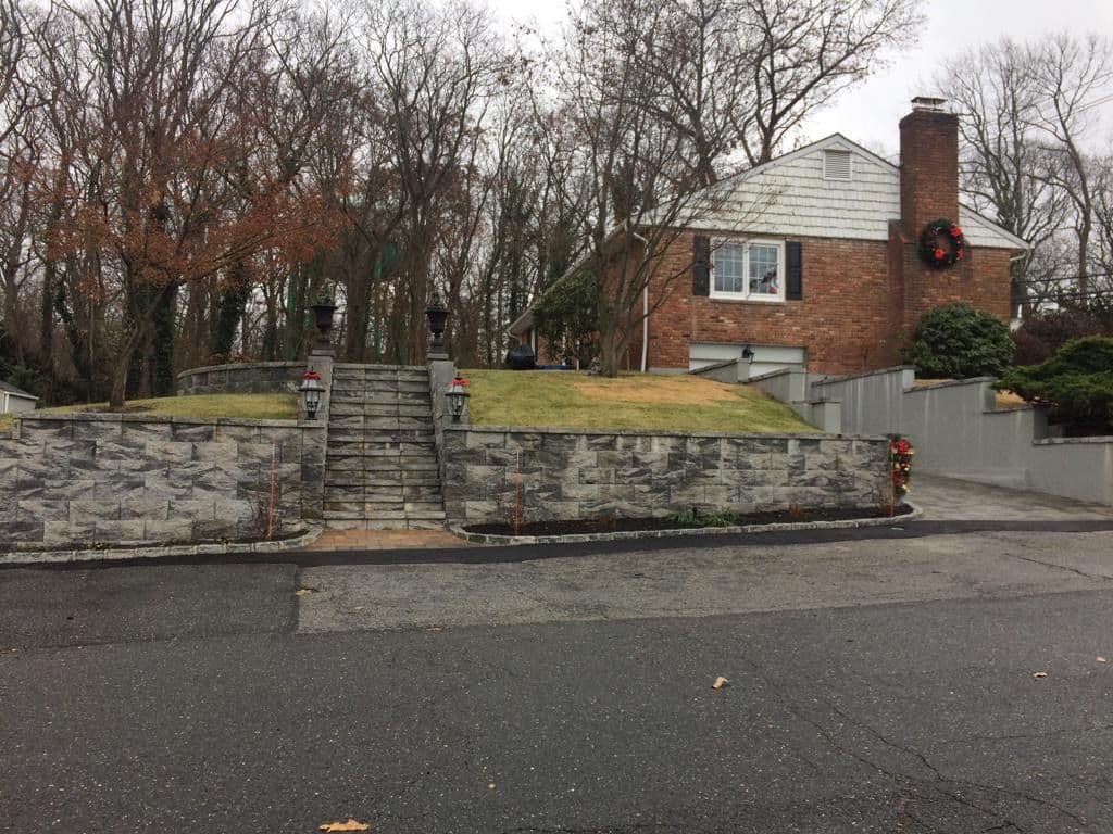 Gallery photos for Stone Retaining Wall and Steps Built for a Sloped Front Yard: Image #1